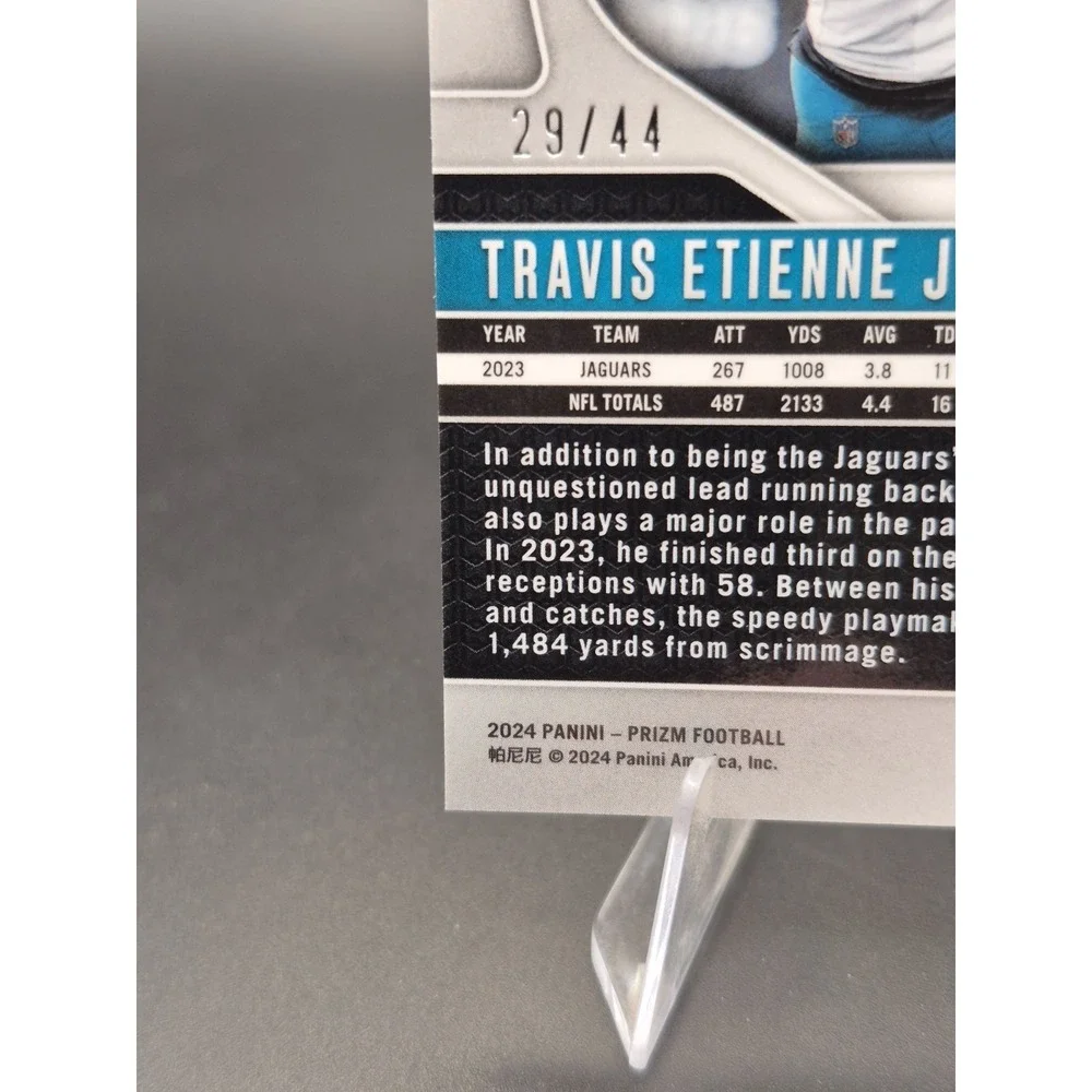 2024 Panini Prizm Travis Etienne Jr. #130 Red & Yellow Prizm /44 Jaguars